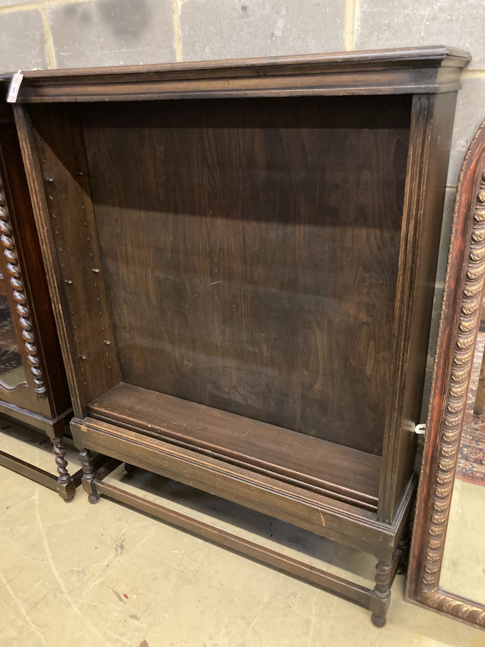 A 1920s oak open fronted bookcase, width 110cm depth 26cm height 141cm